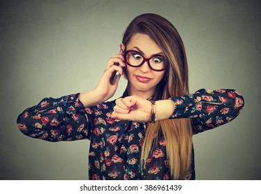 Business And Time Management Concept. Stressed Surprised Business Woman Looking At Wrist Watch, Running Late Forgot About Meeting
