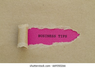 BUSINESS TIPS Word Written Under Torn Paper.