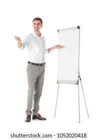 Business Trainer Giving Presentation On Flip Chart Board Against White Background