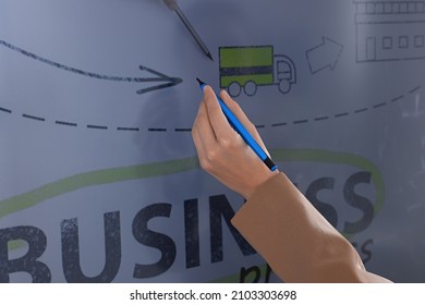 Business Trainer With Pen Using Interactive Board, Closeup