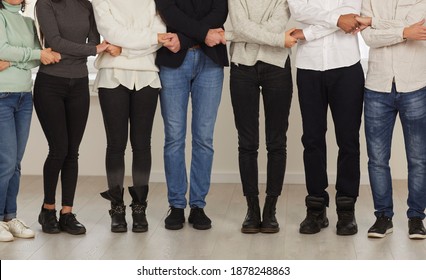 Business Training. Cropped Image Of A Group Of Unrecognizable People Standing In A Row And Holding Hands, Demonstrating The Unity Of The Team. Collaboration, Support, Unity, Solidarity Concept.