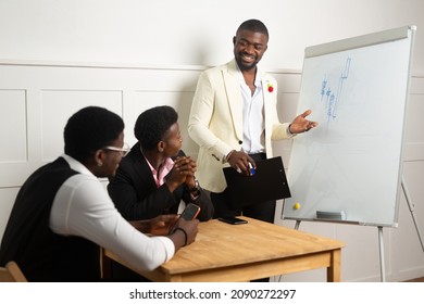 Business Training In The Office Of Three African Men	