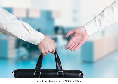 Business Transfer Deal. Handover Of A Suitcase For Money Partners.