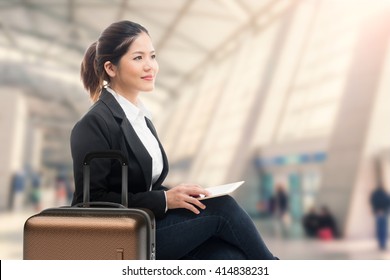 business traveler waiting with airport background