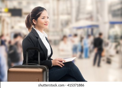 Business Traveler Waiting With Airport Background