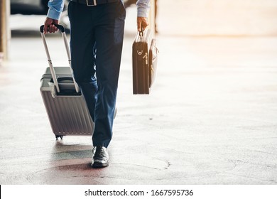 Business travelers are traveling into the country to do business while waiting for the airport trip.