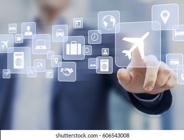 Business trip concept with a businessman touching a button on a screen with icons about travel planning, transportation, hotel, flight and passport