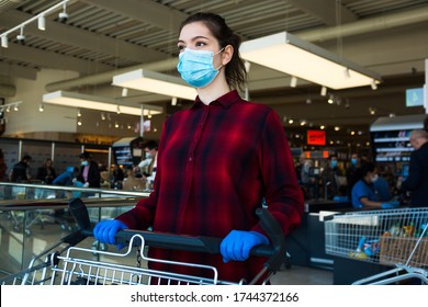 Business As Usual,open Again As Normal,new Norm For Everyday Activities After COVID-19 Coronavirus Pandemic End,obligatory Personal Protective Equipment,face Mask,gloves.Female Shopper Pushing Trolley