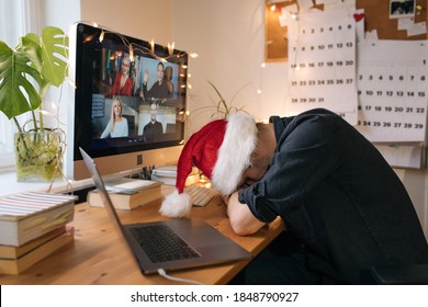 Business Video Conferencing. Young Man Having Video Call Via Computer. Virtual Christmas House Party. Fatigue And Tired Man At Home From Remote Video Work. Sleep At Conference Office. Virtual 2022