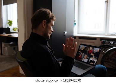 Business Video Conferencing. Young Man Having Video Call Via Computer In The Home Office. Multiethnic Business Team. Virtual House Party. Online Team Meeting Video Conference Calling From Home