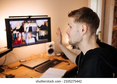 Business Video Conferencing. Young Man Having Video Call Via Computer In The Home Office. Multiethnic Business Team. Virtual House Party. Online Team Meeting Video Conference Calling From Home