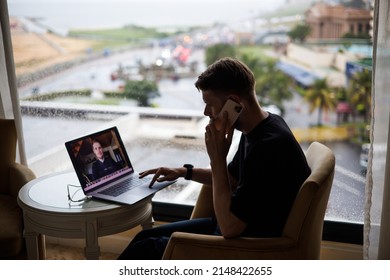 Business Video Conferencing. Young Man Having Video Call Via Computer In The Home Office. Multiethnic Business Team. Virtual House Party. Online Team Meeting Video Conference Calling From Home