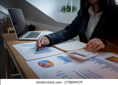 Business Woman Accountant Making Working Audit And Calculating Expense Financial Annual Financial Report Balance Sheet Statement, Doing Finance Making Notes On Paper Checking Inspection.