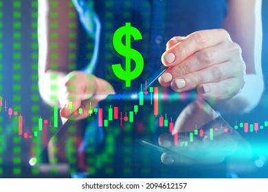 Business woman against the background of the dollar symbol and the stock chart. Investor, stock analyst with a tablet. Currency trading. USD investment. Technical stock analysis chart. - Powered by Shutterstock