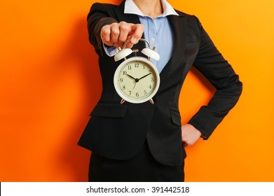 Business woman and alarm clock - Powered by Shutterstock