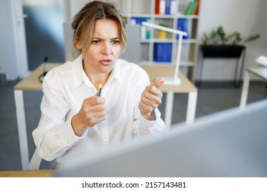 Business Woman Angry With Failure Looking At Computer Screen Broke Pencil