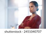 Business woman, arms crossed and anger at the office, upset or unhappy with workplace conflict. Crisis, disaster or stern employee, frustrated and serious for trouble with negative or bad mood