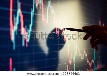 Business woman checking stock market data. Analysis economy data on forex, stock, indices futures, commodities, index earn graph. - Image