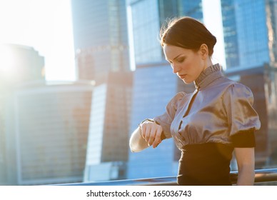 Business Woman Checking The Time Looking At His Watch