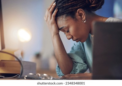 Business woman, depression and stress in an office at night working late on deadline. Tired African entrepreneur person with hands on head for pain, burnout or regret for mistake or fail at work - Shutterstock ID 2348348001