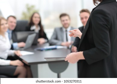 business woman with documents on blurred background office
