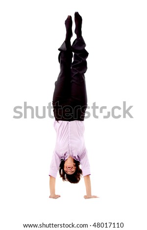 business woman doing the handstand isolated over a white background