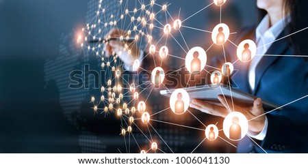 Business woman drawing global structure networking and data exchanges customer connection on dark background