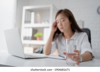 Business Woman Drink Water. She Felt Like She Was Sick In The Office.