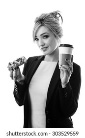 Business Woman Eating A Pasty And Drinking A Coffee To Start Her Day 