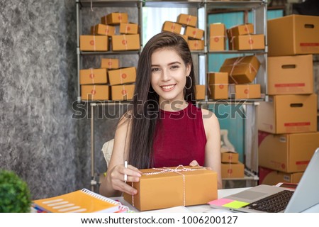 Business woman entrepreneurial success . Sales Online Parcel delivery