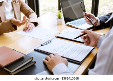 Business woman explaining about his profile to two selection committee manager sitting in during job Interview, interview the job and hiring.