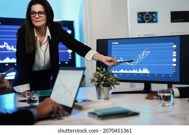 Business Woman Explaining Trading Strategies Inside Bank Meeting Room - Focus On Face