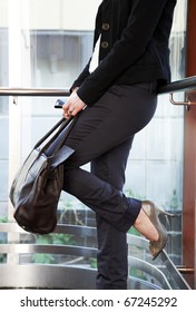 Business Woman In Fancy Elevator