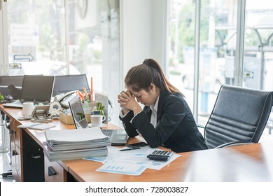 Business Woman Feeling Stress From Work In The Office