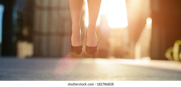 Business Woman Feet Jumping Concept Series