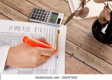 Business Woman Filing Federal Income Tax Form 1040