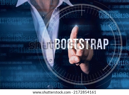 Business Woman with finger pressing Bootstrap button on virtual screens. Modern technology concept  Stockfoto © 