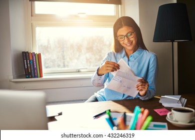 Business Woman Getting Ready To Mail A Letter Looking Satisfied