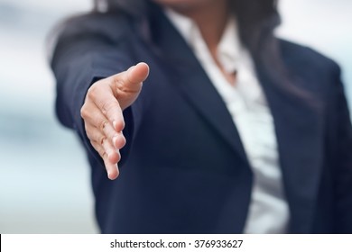 Business Woman Giving A Handshake.