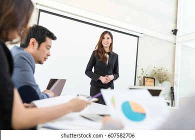 Business Woman Giving Presentation