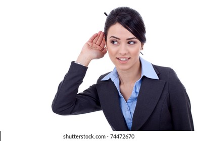 Business woman with hand to ear listening over white - Powered by Shutterstock