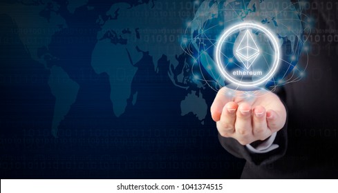 Business woman hand holding ethereum coin and global network connection design with copy space