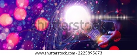 Business woman hand touching lightbulb Introduction of artificial intelligence. Big Data concept.Digital neural network.Cyberspace of future.Science and innovation of technology. 