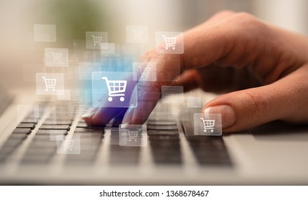Business woman hand typing on keyboard with online shopping concept
