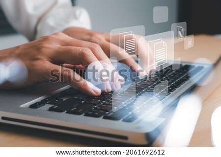Business woman hand using laptop computer with document management icon, Document management data system business internet technology concept. Photo stock © 