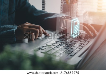 Business woman hand using laptop computer with document management icon, Document management data system business internet technology concept.	 Photo stock © 