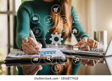 
business woman hand working with laptop computer, and smart phone in office with digital marketing media  in virtual icon 
 - Powered by Shutterstock