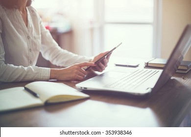 Business Woman Hand Working Laptop Computer On Wooden Desk