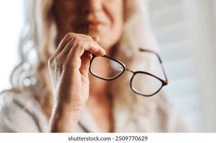 Business, woman and hands with glasses in home for vision, bluelight and lens for eye care. Zoom, freelancer and closeup of entrepreneur with eyewear for clear sight, frame design and help to see