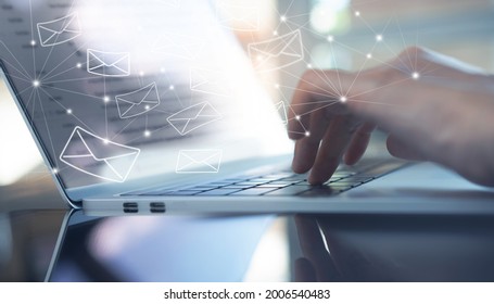 Business Woman Hands Typing On Laptop Computer With Email Icon, Email Sent, Direct Marketing Concept